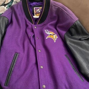 Men’s Minnesota Vikings bomber jacket, lightly used older faded on shoulders